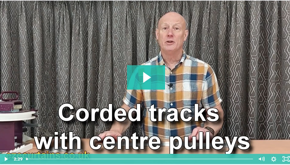 corded tracks with centre pulleys