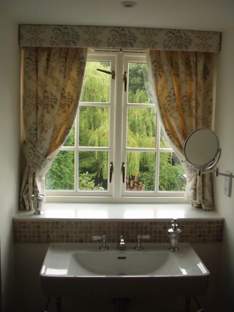 Simple bathroom curtain pelmet to dress this small window. Note how it does not really cover the window. So still allowing in lots of light.