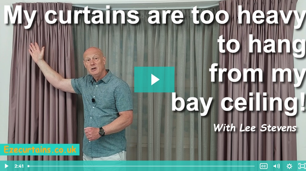 hanging heavy curtain in a bay