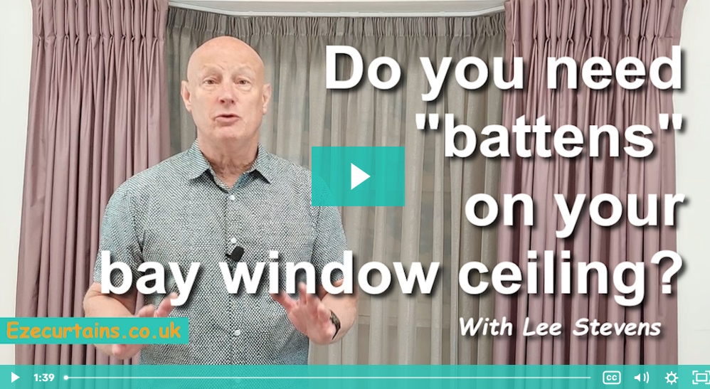 hanging heavy curtains in a bay